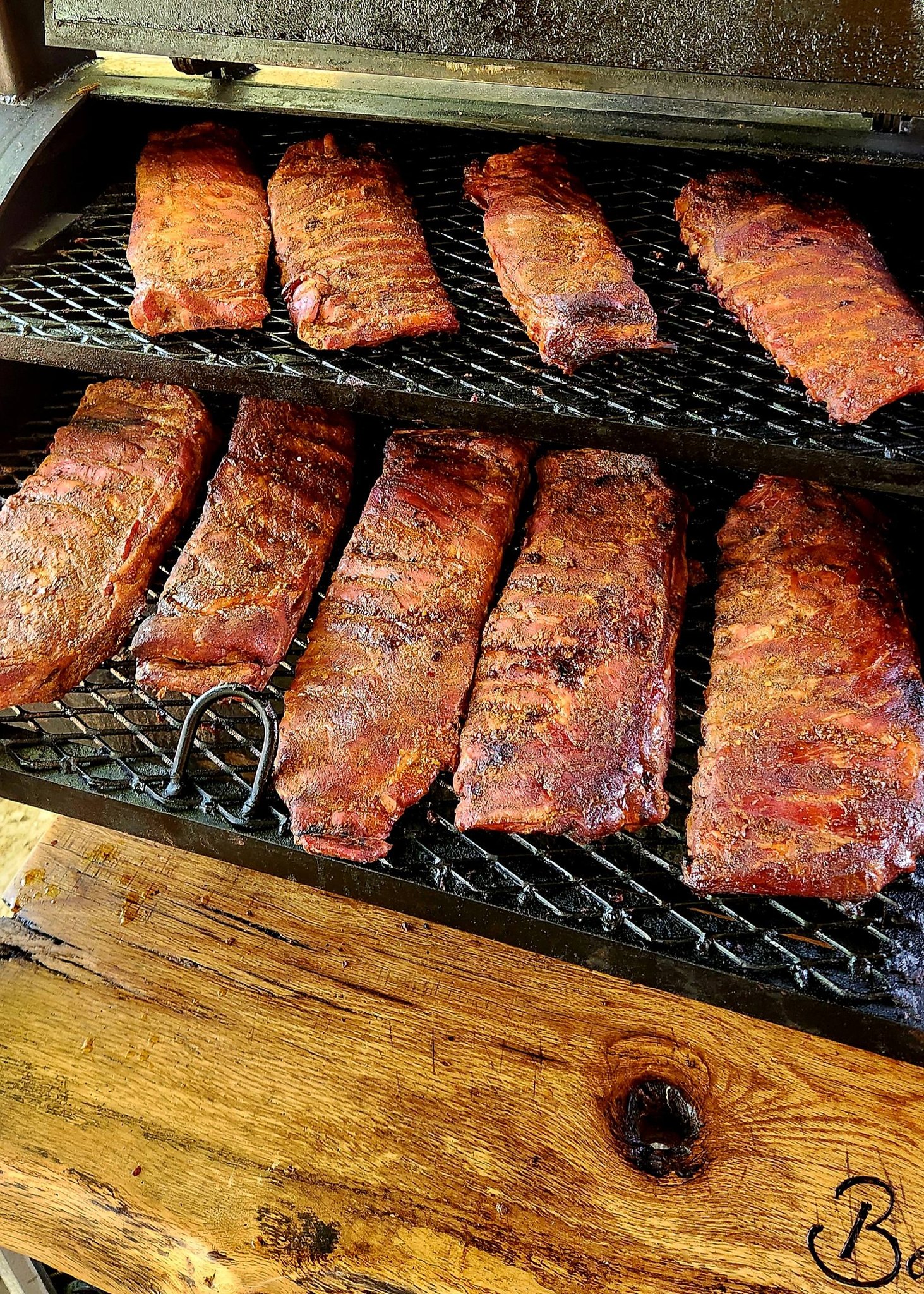 Rubbed rib slabs resting on the prep table